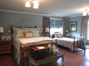 Postel nebo postele na pokoji v ubytování Casa Breeze B & B
