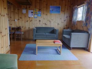 Posezení v ubytování Ossies Motels and Chalets