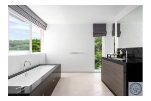Kuchyň nebo kuchyňský kout v ubytování Panorama Samui Residences