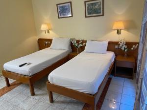 Posteľ alebo postele v izbe v ubytovaní Maple Leaf Korean Hotel