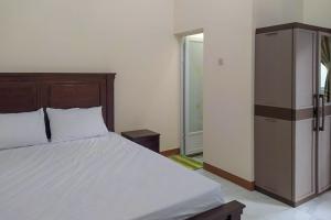 Katil atau katil-katil dalam bilik di RedDoorz Syariah near Exit Tol Pemalang