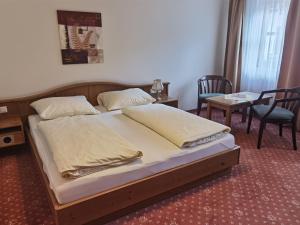Voodi või voodid majutusasutuse Hotel Kroneck toas