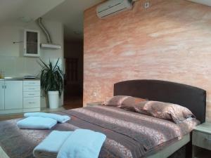 Tempat tidur dalam kamar di Apartment Loft