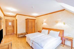 Vuode tai vuoteita majoituspaikassa Aux Tanneries de Wiltz