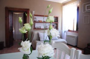 A seating area at Casale Dolci Dimore