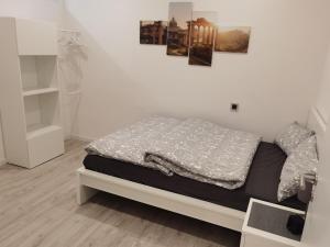 Postel nebo postele na pokoji v ubytování Main Appartement-Haus - 97896 Freudenberg