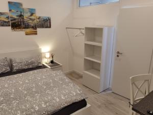 Postel nebo postele na pokoji v ubytování Main Appartement-Haus - 97896 Freudenberg