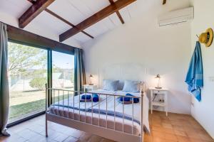 Postel nebo postele na pokoji v ubytování Casa Piscina + 15 fotografií