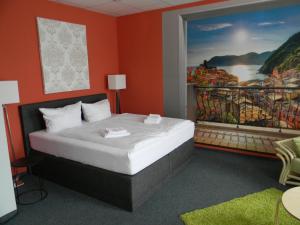 Un pat sau paturi într-o cameră la Rothenberger