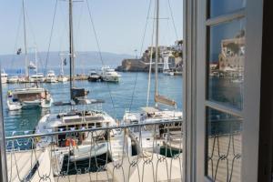 a view of a marina with boats in the water at THE YDRA VIEW APARTMENTS in Hydra