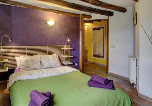 En eller flere senge i et værelse på Casa Rural Villa Sila