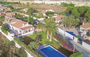 an aerial view of a house with a swimming pool at Stunning Home In El Campello With Wifi in El Campello