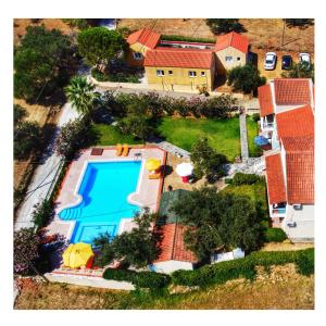 an aerial view of a house with a swimming pool at Aria in Lakithra