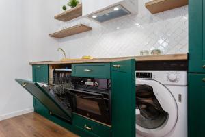 Kuchnia lub aneks kuchenny w obiekcie TACITA Family Home by Cadiz4Rentals