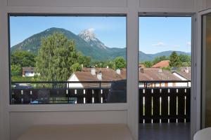a view of a mountain from a window at Ferienwohnung Sonnendeck mit Bergblick in Bad Reichenhall