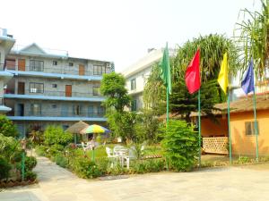 Un jardín fuera de Hotel Greenland