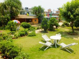 Un jardín fuera de Hotel Greenland