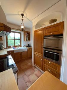 Köök või kööginurk majutusasutuses Ferienwohnung mit Herz Seebruck am Chiemsee