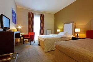 Posteľ alebo postele v izbe v ubytovaní IMPIQ Hotel + 21 fotografií