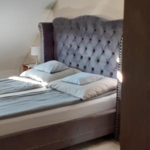 Postel nebo postele na pokoji v ubytování Lux Apartman Villa