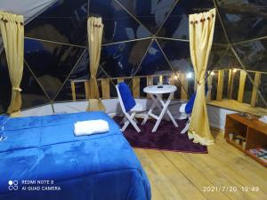 Postel nebo postele na pokoji v ubytování Skyline Glamping Guasca