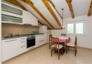 Kuchyň nebo kuchyňský kout v ubytování Guest House Zaton - Zaton Veliki