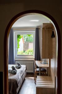 Postel nebo postele na pokoji v ubytování Hotel Steyerberger Hof