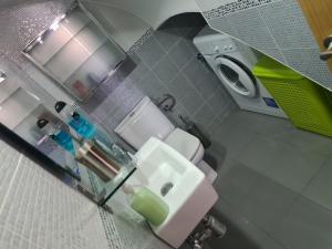 Ein Badezimmer in der Unterkunft Apartamento El Remo