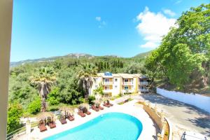 an aerial view of a resort with a swimming pool at Avra Sunset Sea View Liapades in Liapades