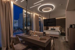 Postel nebo postele na pokoji v ubytování Hellenic Vibes Smart Hotel + 37 fotografií