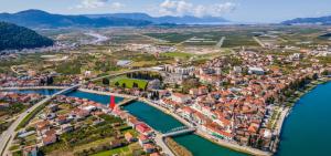 an aerial view of a city next to a river at Villa OpuZEN in Opuzen