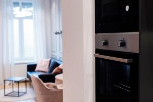 Kuchnia lub aneks kuchenny w obiekcie ZEUS Design Apartments Wasserwelt