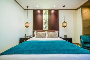 Katil atau katil-katil dalam bilik di TIME Rako Hotel