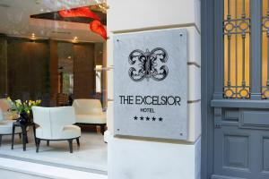 a sign on the door of a restaurant at The Excelsior - Small Luxury Hotels of the World in Thessaloniki