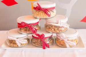 a group of four jars filled with different types of food at Willowbrook Country House in Somerset West