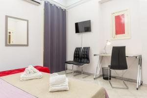 TV a/nebo společenská místnost v ubytování B&B Torre Lauro
