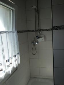 Ванная комната в Ferienwohnung A&K