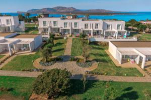 an aerial view of a house with a garden at Capo Falcone Charming Apartments in Stintino