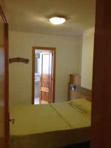 Cama o camas de una habitación en Apartamentos Benidorm City