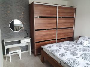 Postel nebo postele na pokoji v ubytování Family apartmán Kovářská