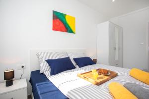 Katil atau katil-katil dalam bilik di Apartment Iva