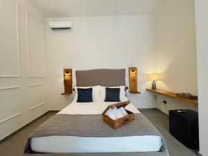 Postel nebo postele na pokoji v ubytování Dimora Terranova Charming Rooms