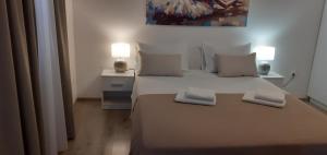 Postel nebo postele na pokoji v ubytování Rooms Marija