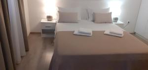 Postel nebo postele na pokoji v ubytování Rooms Marija