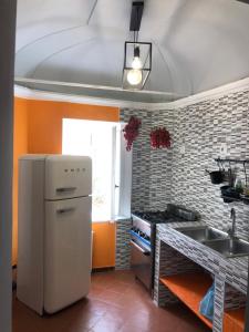 Η κουζίνα ή μικρή κουζίνα στο H Hostel Friendly Accommodation