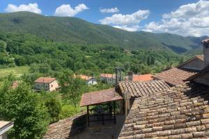 a view of a village with mountains in the background at Casa Graziana in Terni