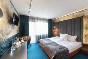 Postel nebo postele na pokoji v ubytování Stara Pravda Hotel