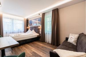 Postel nebo postele na pokoji v ubytování Hotel Demas München-Unterhaching