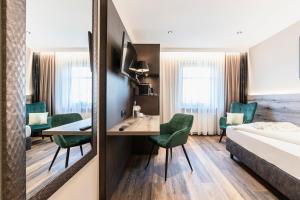 Postel nebo postele na pokoji v ubytování Hotel Demas München-Unterhaching