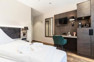 Postel nebo postele na pokoji v ubytování Hotel Demas München-Unterhaching